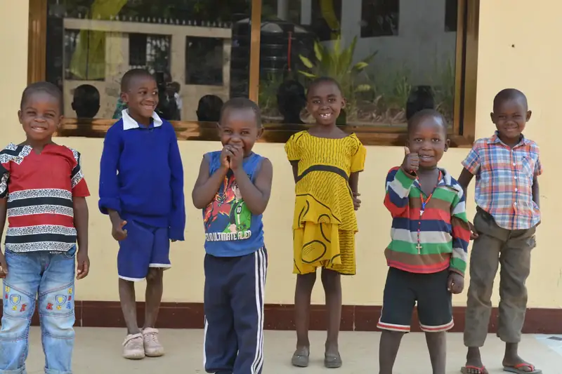 Children standing together outside their CarePoint