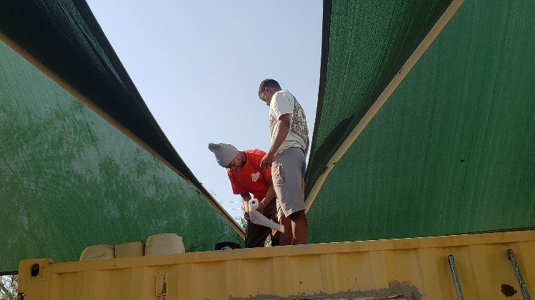 Repairing the shade netting at Keetmanshoop